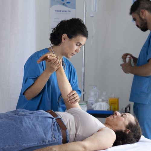 side-view-nurse-helping-patient